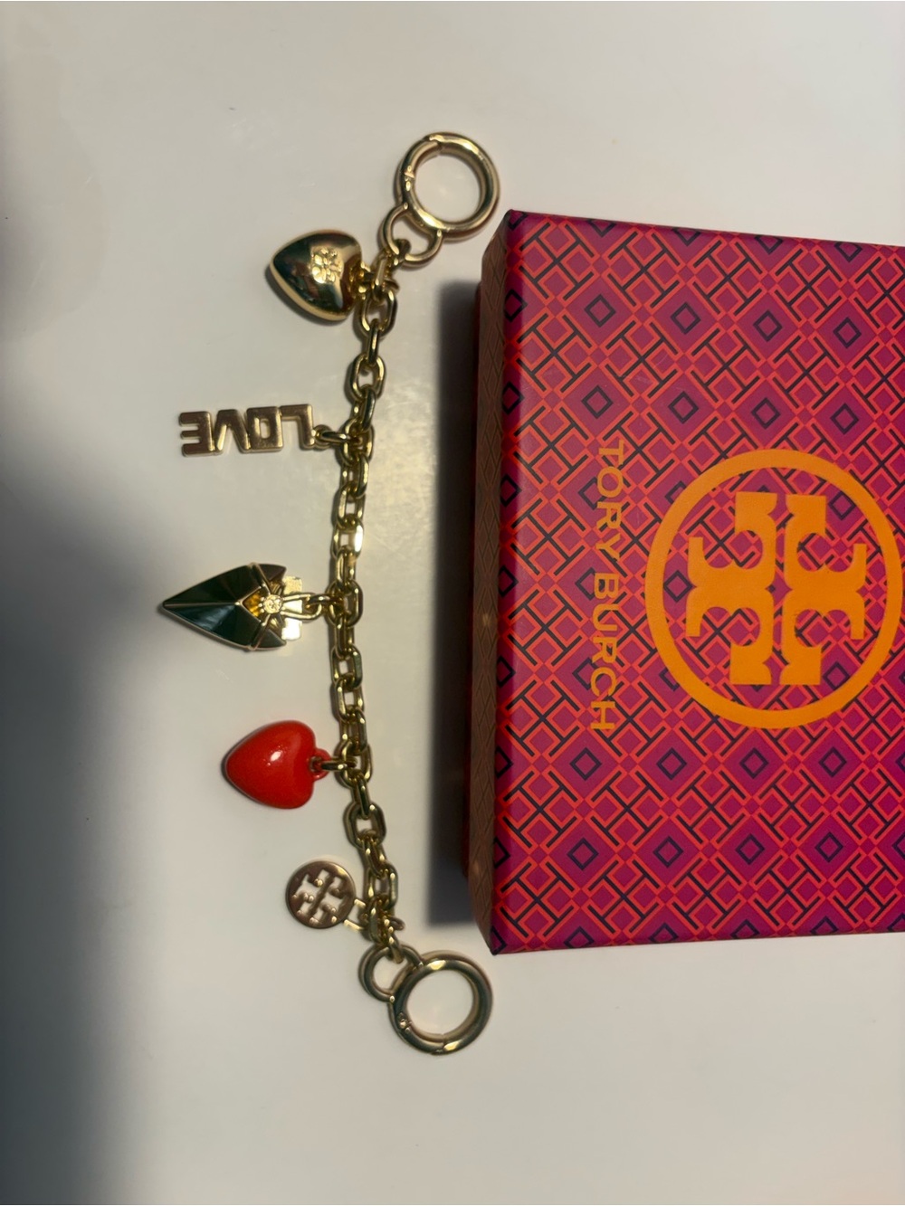 Tory Burch Gold-Tone Charm Bracelet with Red Heart and Green Enamel Leaf NWOT